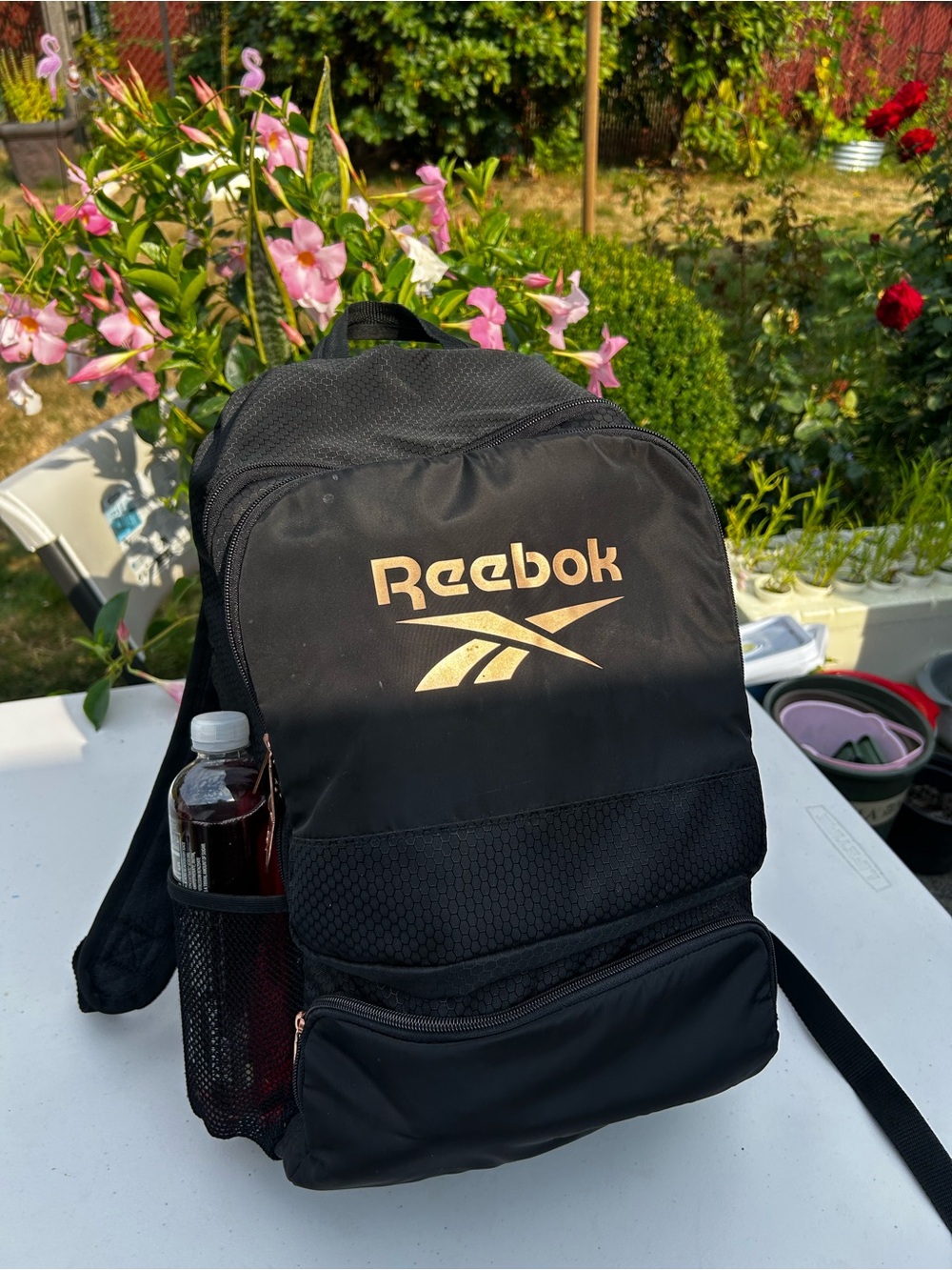 Reebok Black Backpack with Gold Logo and Mesh Side Pocket Sz 19”x12”x8”